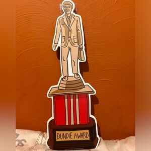 “Dundie Award” wooden statue